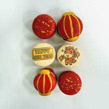 Load image into Gallery viewer, Decorative macarons with festive designs on a white background